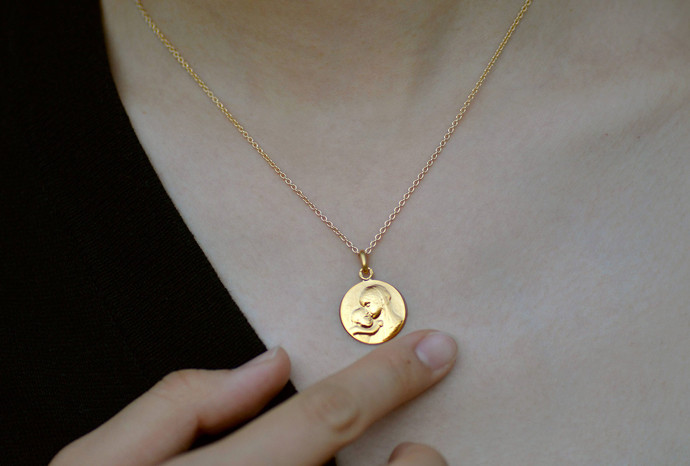 Medaille de bapteme en or 18 cartats, fabrication exclusive Médailles Canale Paris